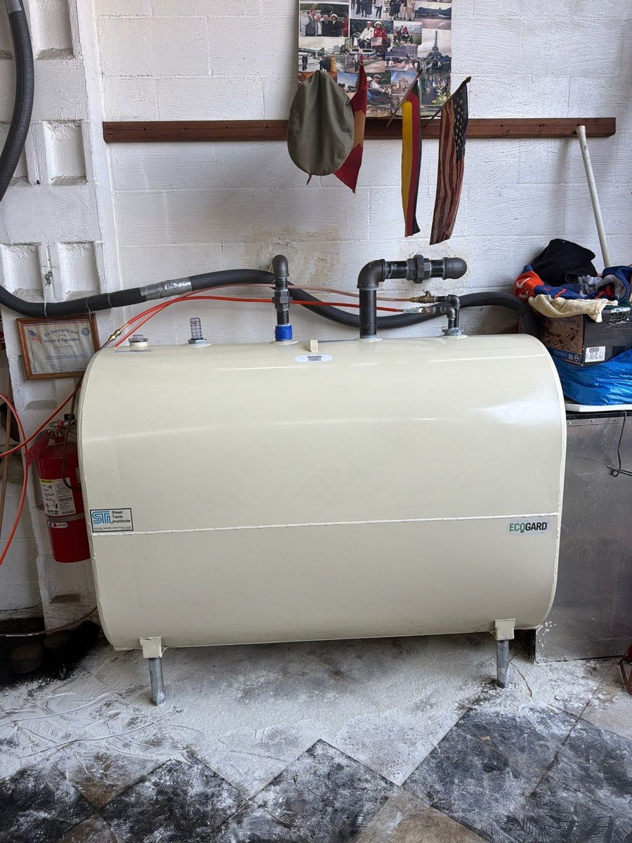 Indoor EcoGard double-bottom heating oil tank installed in a garage