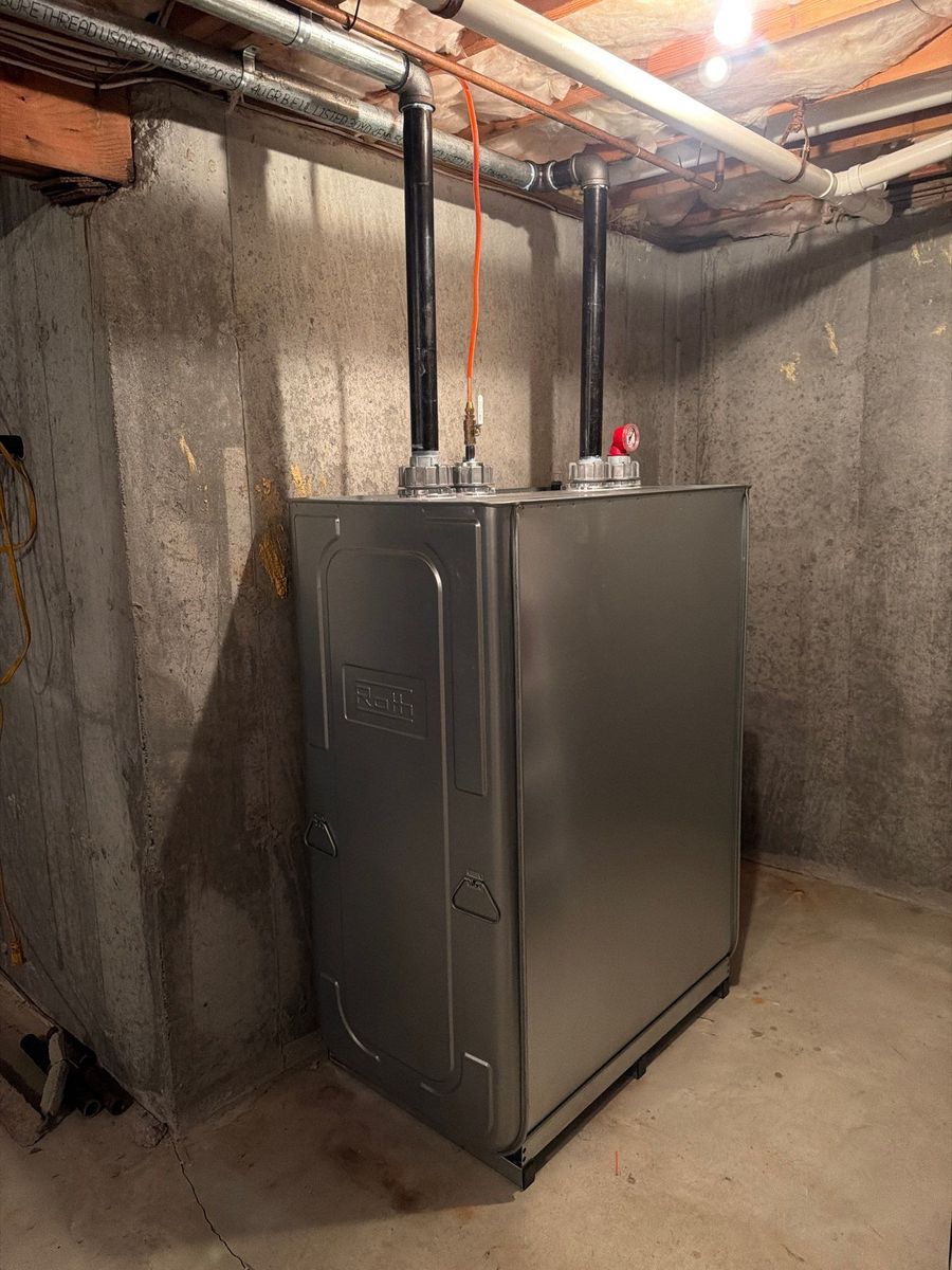 Roth double-wall heating oil tank installed in an unfinished basement